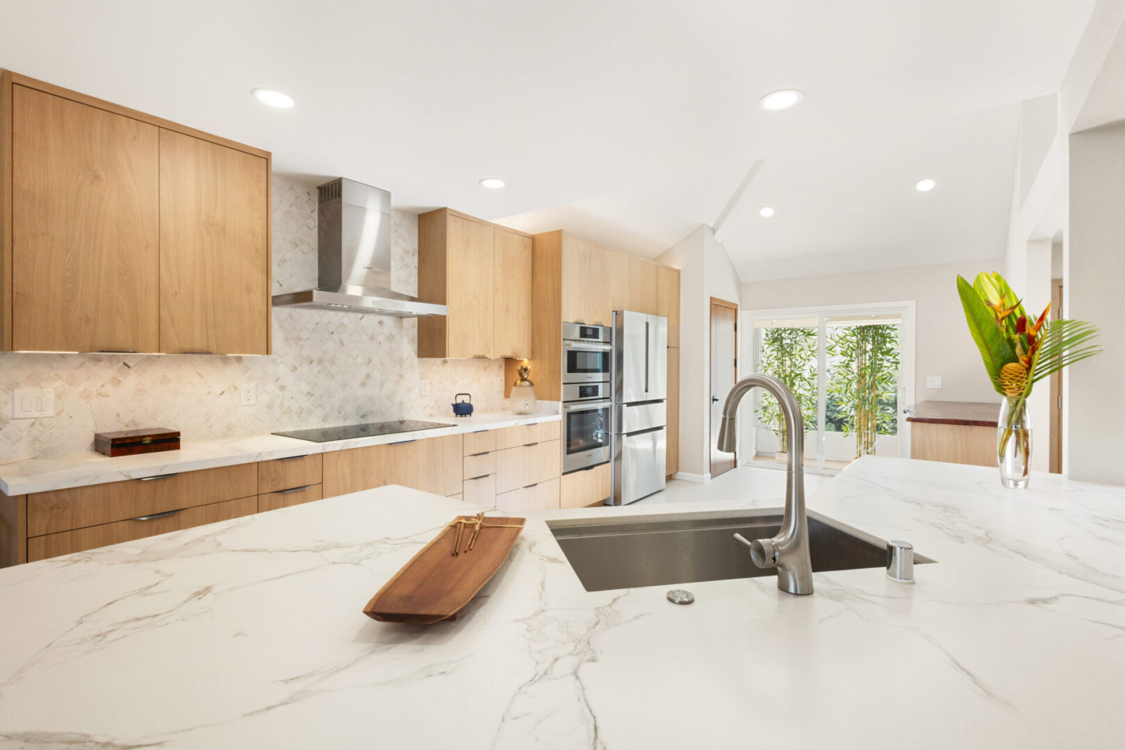 Modern kitchen with marble island and sink
