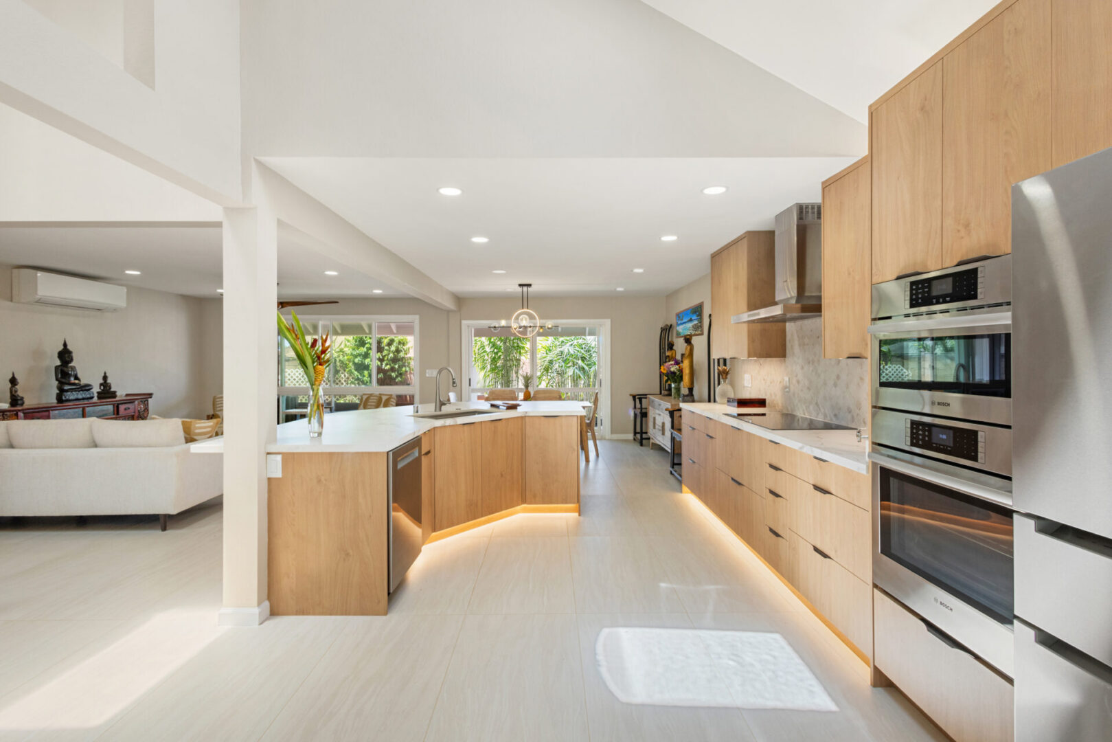 Modern open-concept kitchen with wooden island